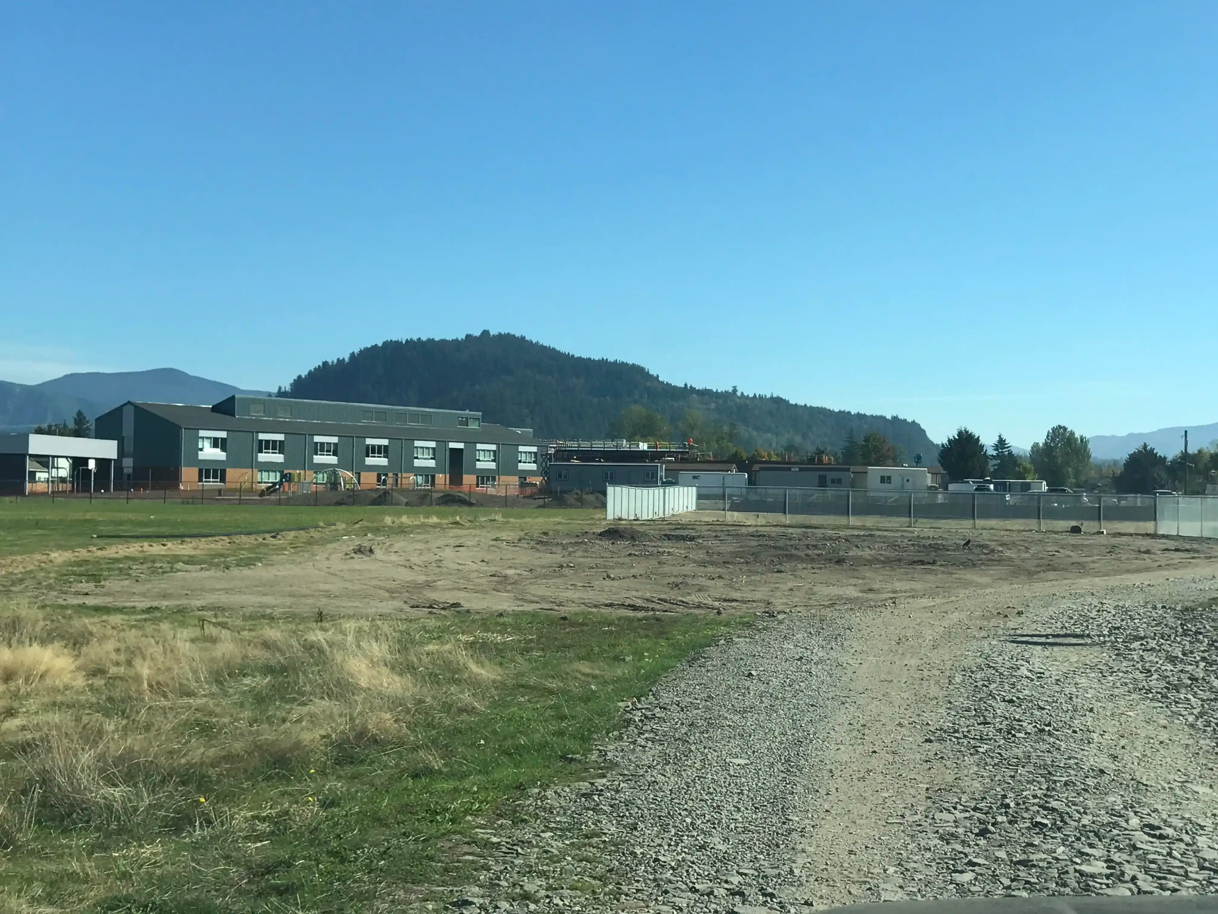 Photo of 'B-wing' roofed and sided from across the large playfield.' Photo of 'B-wing' roofed and sided from across the large playfield.'
